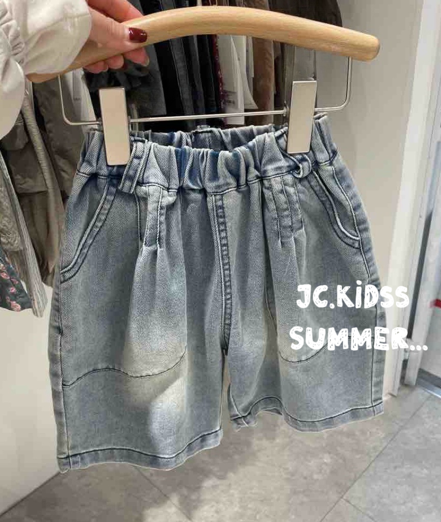 pair of blue washed denim shorts
